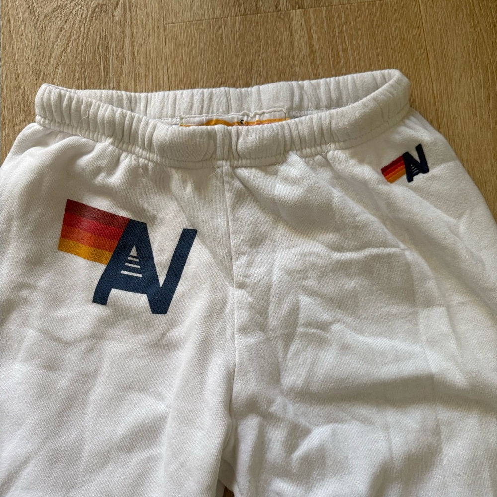Aviator Nation White Track Joggers with Sunset Stripe & Navy 'A' Logo - Picture 3 of 8